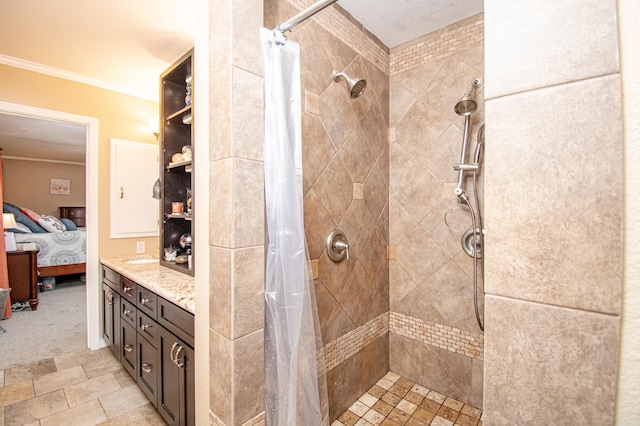 bathroom featuring curtained shower, crown molding, and vanity