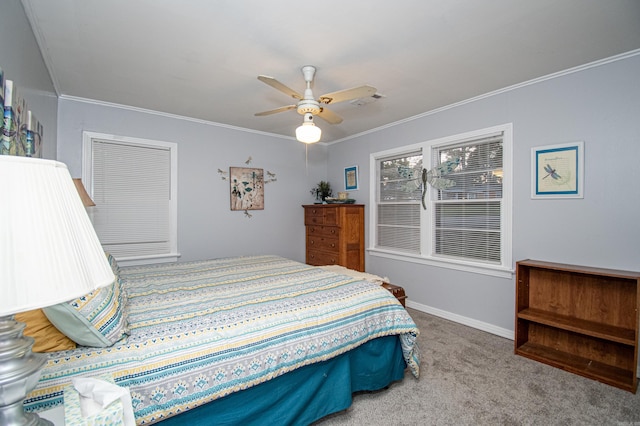 bedroom featuring carpet flooring, ceiling fan, and crown molding