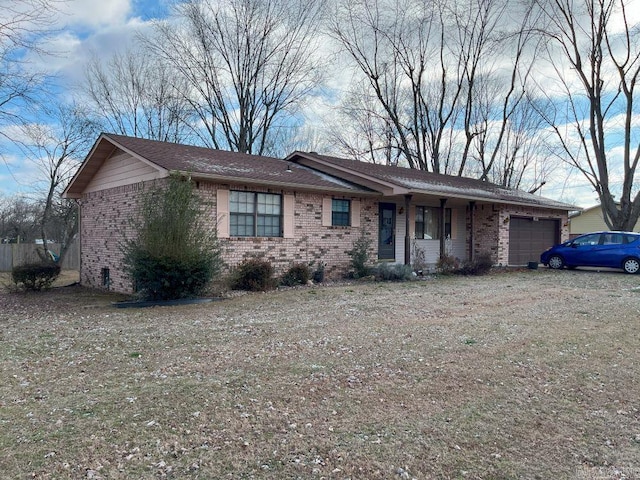 ranch-style house featuring a garage