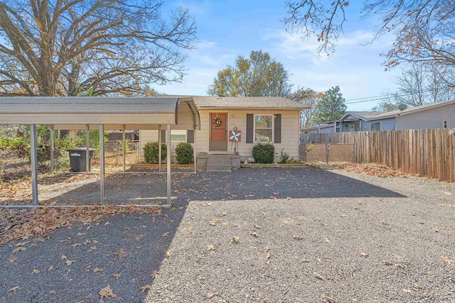 view of front of house with a carport