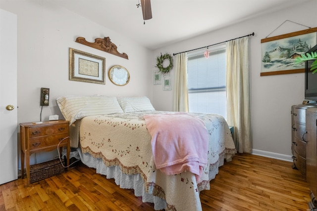 bedroom featuring ceiling fan and wood-type flooring