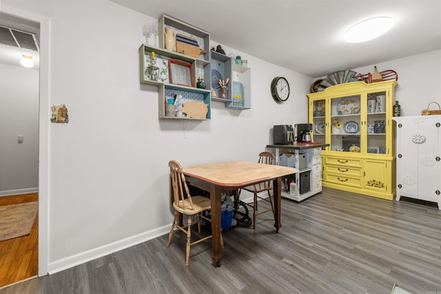 dining room featuring dark wood-type flooring