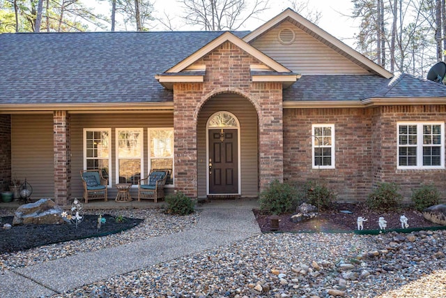 ranch-style house featuring a porch