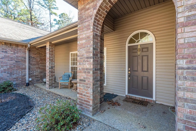 doorway to property featuring a porch