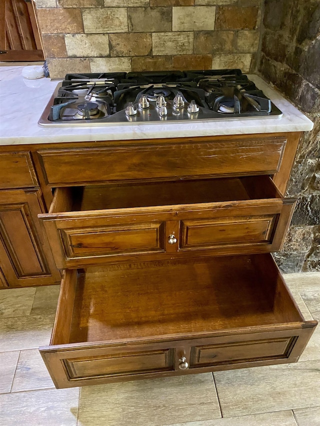 interior details with stainless steel gas stovetop