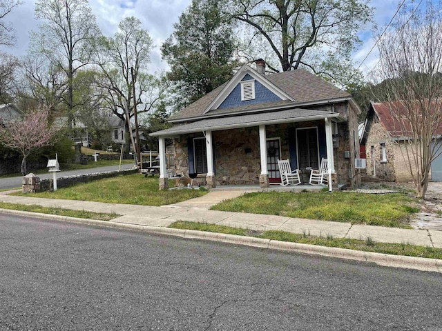 bungalow-style home with a porch