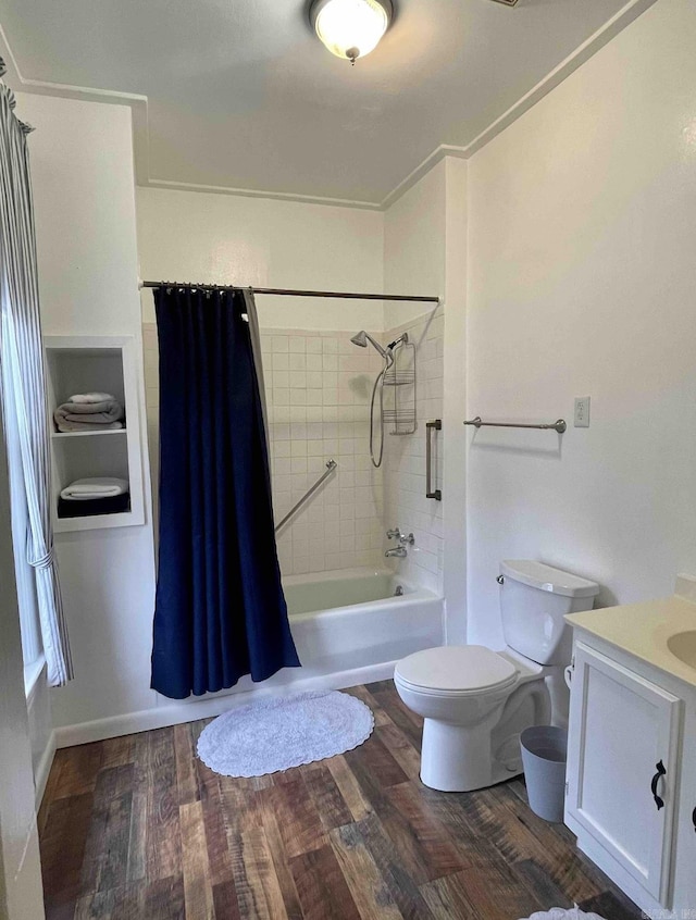 full bathroom with vanity, toilet, shower / bath combo with shower curtain, and wood-type flooring