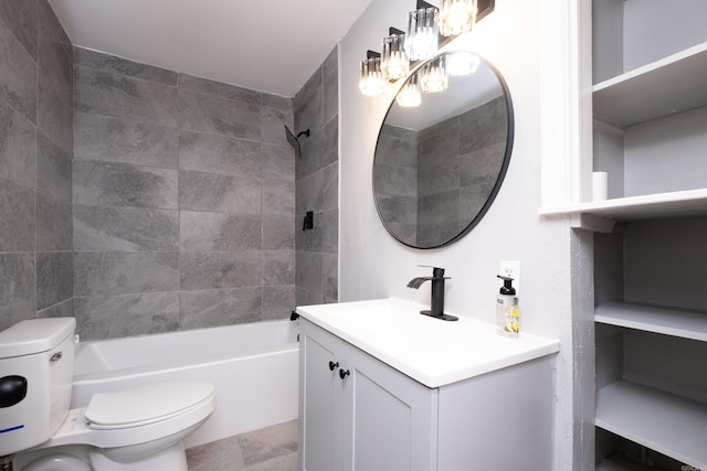 full bathroom featuring vanity, tiled shower / bath combo, and toilet