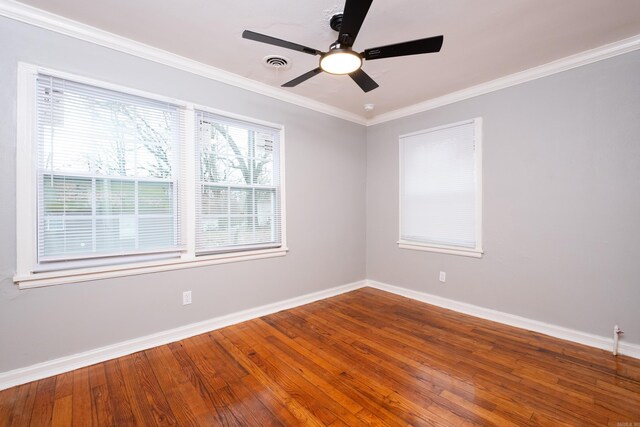 unfurnished room with ceiling fan, crown molding, and hardwood / wood-style flooring