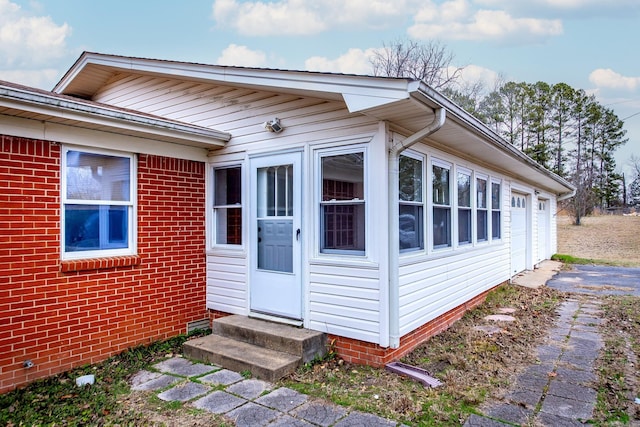 exterior space with a garage