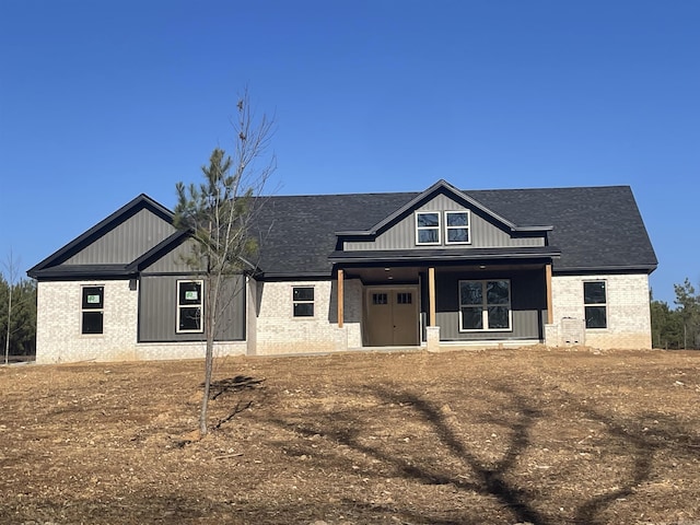 modern farmhouse with a porch