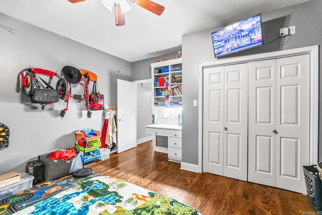 game room featuring dark hardwood / wood-style floors and ceiling fan