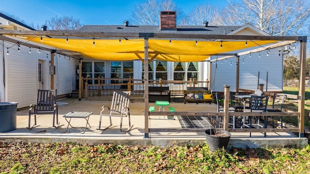 rear view of house featuring a patio area