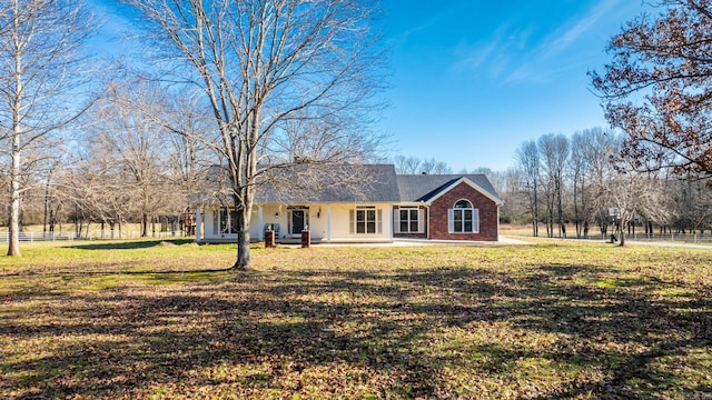 single story home with a front yard