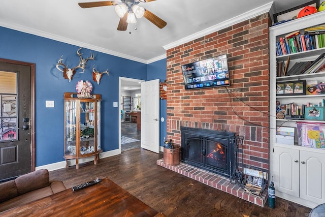 living room featuring a brick fireplace, ceiling fan, dark hardwood / wood-style flooring, and ornamental molding