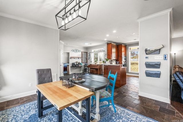 dining room with crown molding