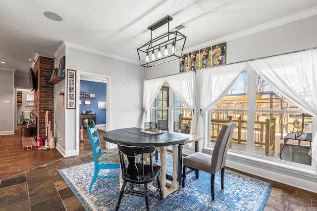 dining room featuring ornamental molding