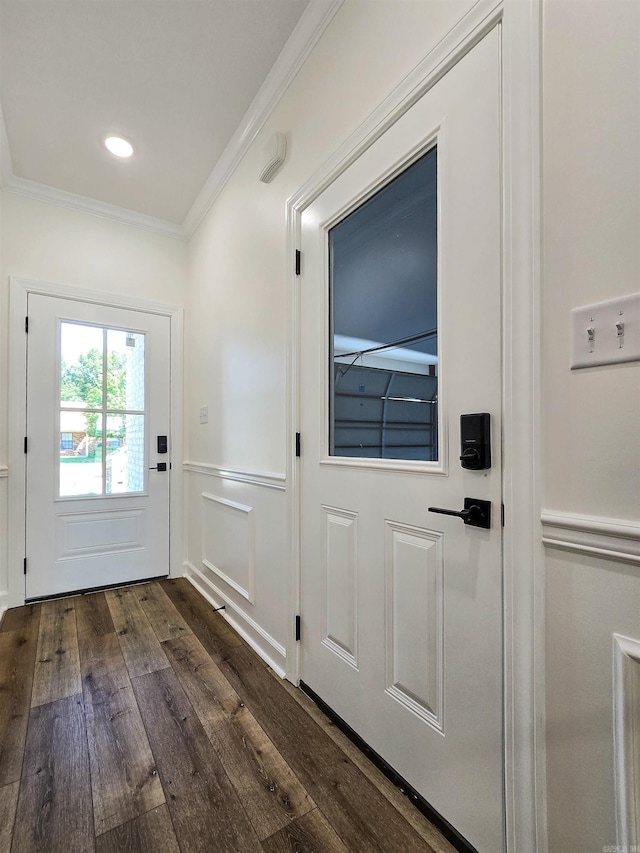 entryway featuring dark hardwood / wood-style flooring and crown molding