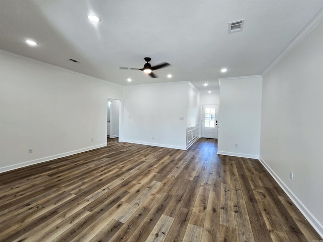 spare room with ceiling fan, dark hardwood / wood-style floors, and ornamental molding