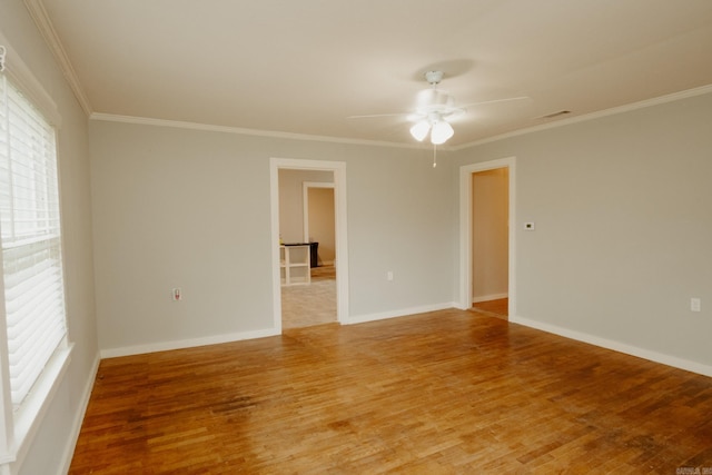 unfurnished room featuring crown molding, ceiling fan, and wood-type flooring