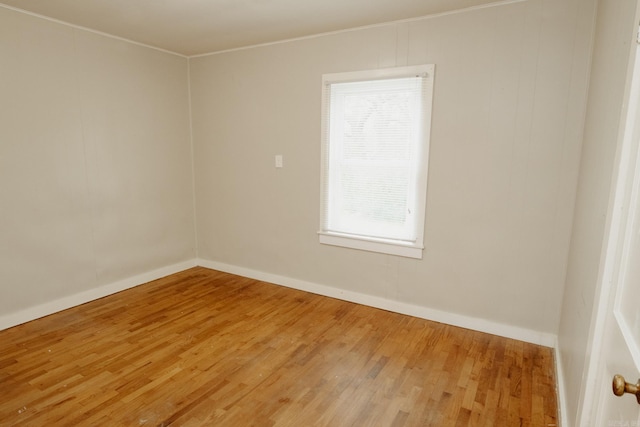 spare room featuring hardwood / wood-style floors