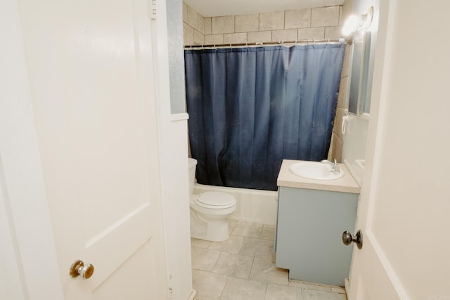 full bathroom featuring shower / bath combo, vanity, and toilet