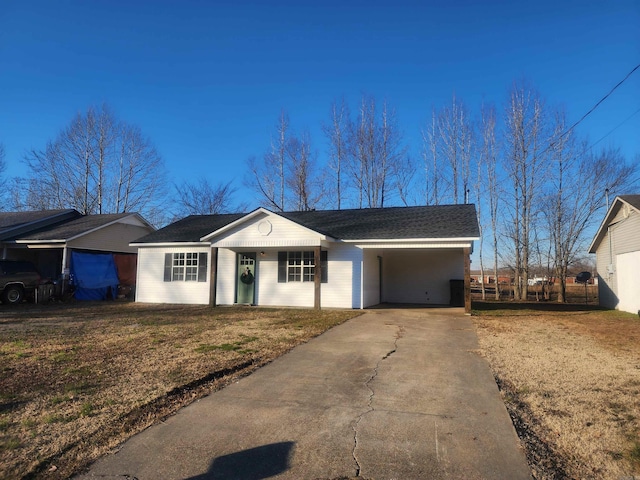 single story home with a carport