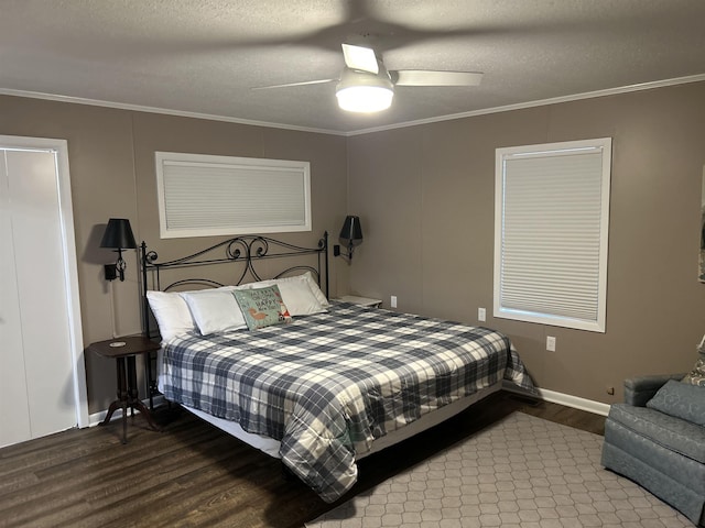 bedroom with ornamental molding, hardwood / wood-style floors, ceiling fan, and a textured ceiling