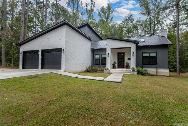 modern home with a garage and a front yard