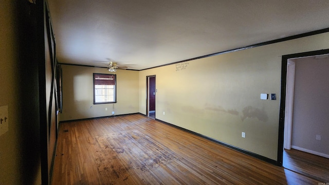 unfurnished room with crown molding, ceiling fan, and hardwood / wood-style flooring