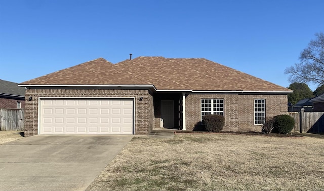 ranch-style house featuring a garage