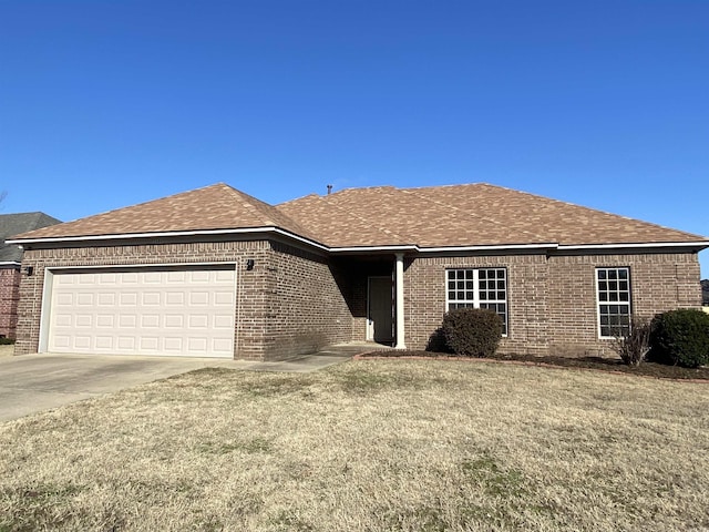 single story home featuring a garage