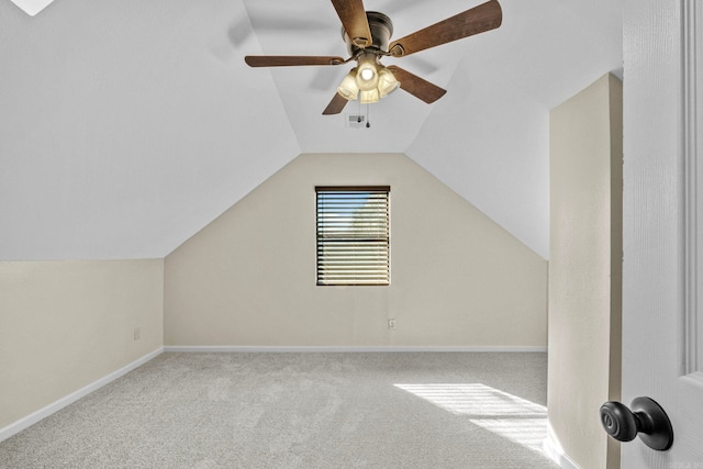 bonus room featuring ceiling fan, light colored carpet, and lofted ceiling