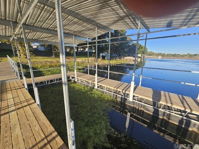 dock area with a water view