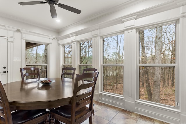 sunroom with ceiling fan and a healthy amount of sunlight