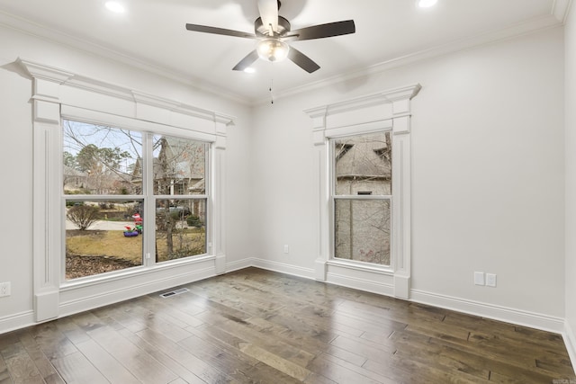 unfurnished room featuring ceiling fan, dark hardwood / wood-style flooring, and ornamental molding