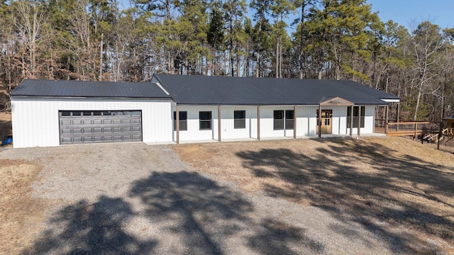 modern farmhouse style home featuring a garage