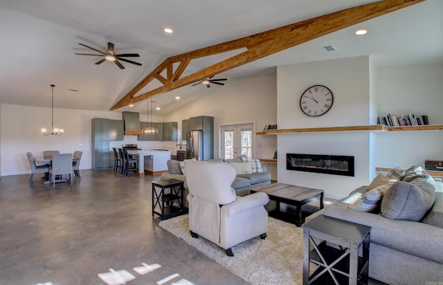 living room with beam ceiling, high vaulted ceiling, concrete flooring, and ceiling fan with notable chandelier