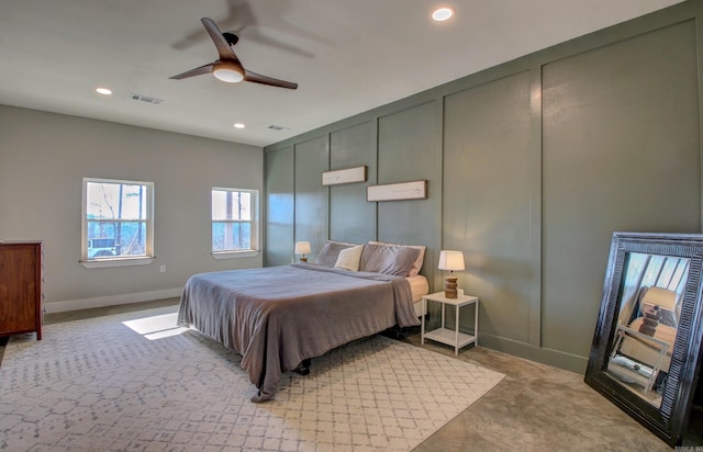 bedroom with light carpet and ceiling fan