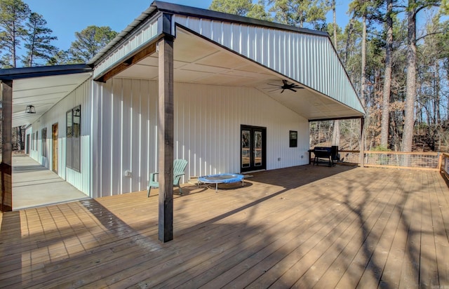 deck featuring a trampoline and ceiling fan