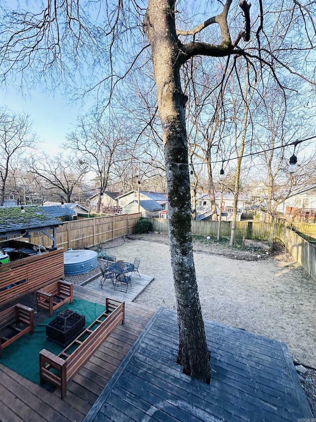 dock area featuring a deck and a jacuzzi