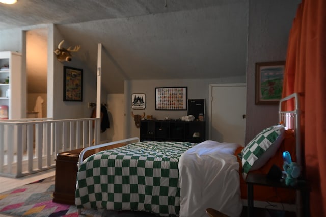 bedroom with vaulted ceiling