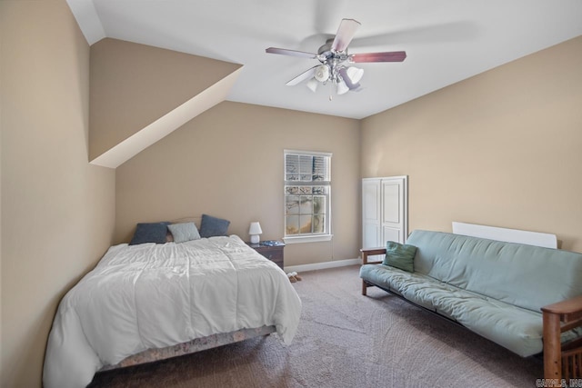 bedroom featuring carpet flooring, vaulted ceiling, and ceiling fan