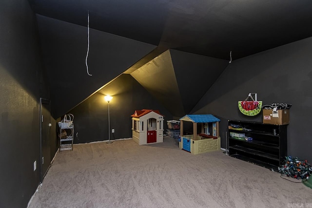 game room featuring carpet floors and lofted ceiling