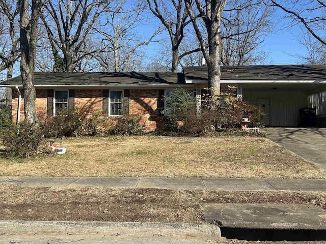 ranch-style house with a carport