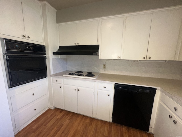 kitchen featuring decorative backsplash, white cabinetry, dark hardwood / wood-style flooring, and black appliances