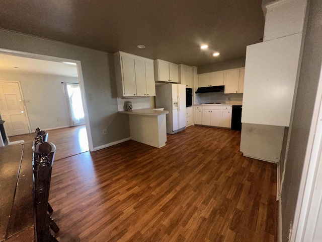 kitchen with white refrigerator with ice dispenser, black dishwasher, dark hardwood / wood-style floors, and white cabinetry