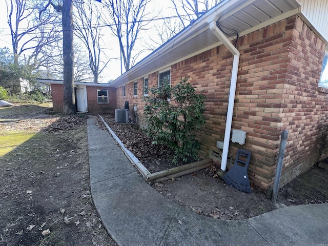 view of property exterior featuring central AC unit