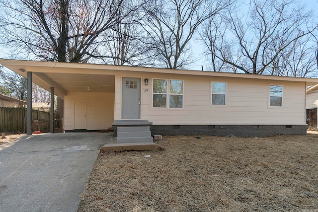 view of front of home with a carport