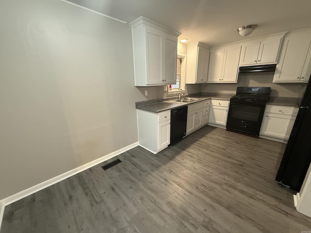 kitchen featuring black appliances, dark hardwood / wood-style flooring, white cabinetry, and sink